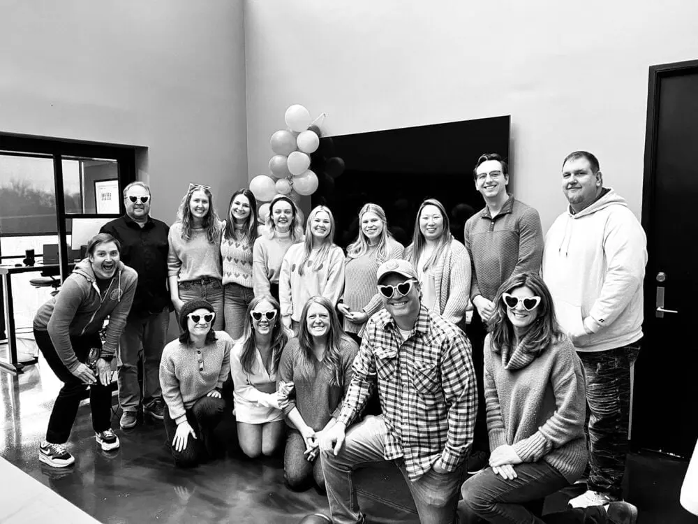 The Whitehardt team together at an office celebration